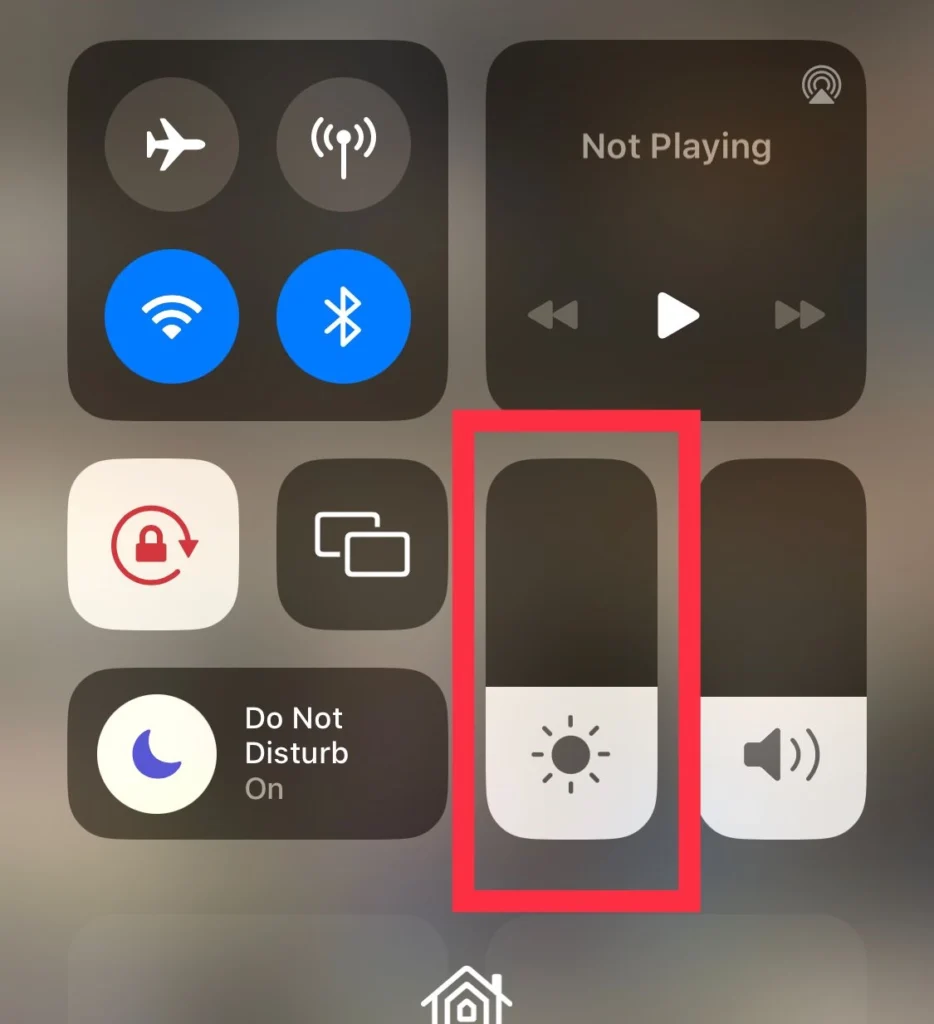 Adjust the screen brightness from the control centre.
