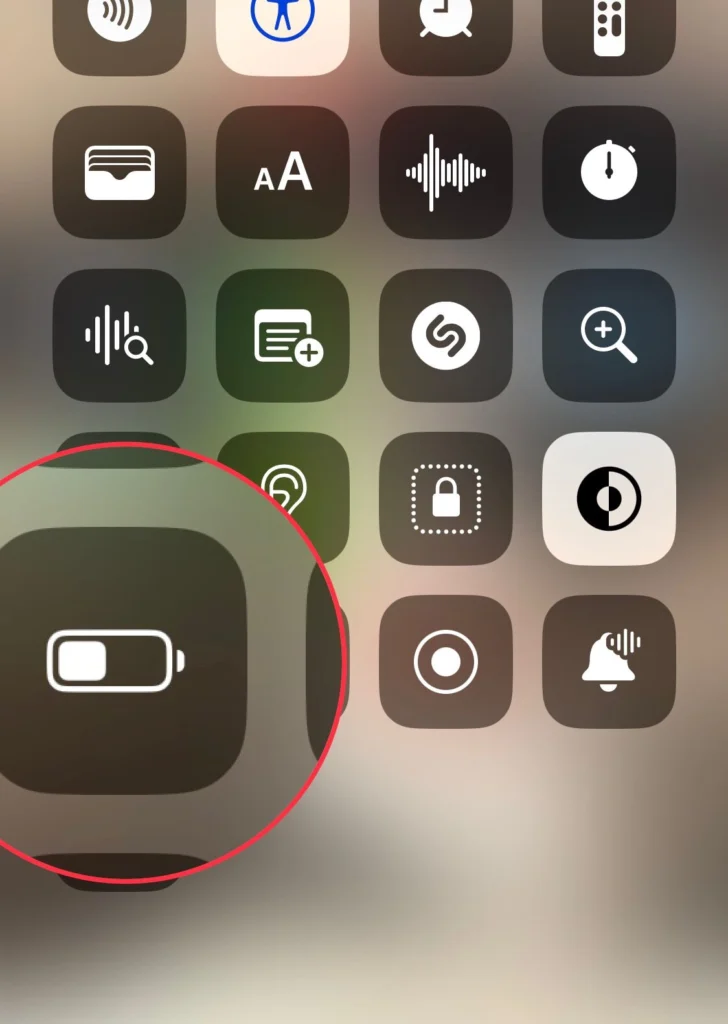 Enable the Low Power Mode from the Control Centre.